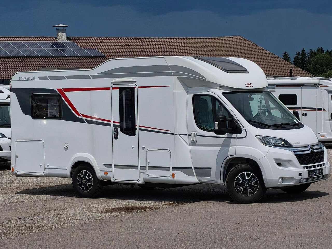 Teilintegriertes Wohnmobil LMC Tourer lift H 730 ,Hubbett,- Photo 2