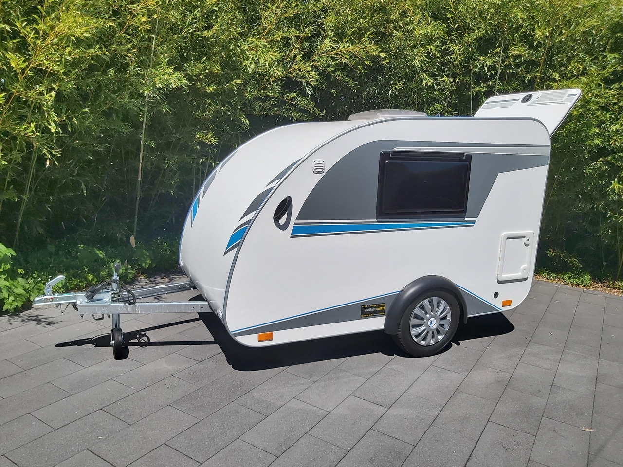 Wohnwagen Mini Camper Mini Tommy TMC25 Basic V1 252x140x121cm Küche 100km/H 750kg ohne Bremse Winter Aktion Mini Camper Mini Tommy TMC25 Basic V1 252x140x121cm Küche 100km/H 750kg ohne Bremse Winter Aktion- Photo 2